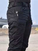 Calça cargo masculina tática de tecido ripstop em poliéster com múltiplos bolsos com zíper na lateral e coxa, corte reto e passante largo para cinto tático, disponível em várias opções de tamanho do P ao EGG, ideal para uso urbano e ao ar livre.