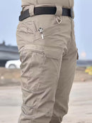 Calça cargo masculina tática de tecido ripstop em poliéster com múltiplos bolsos com zíper na lateral e coxa, corte reto e passante largo para cinto tático, disponível em várias opções de tamanho do P ao EGG, ideal para uso urbano e ao ar livre.